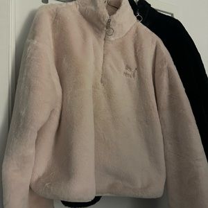 Ladies PUMA sweater coats.